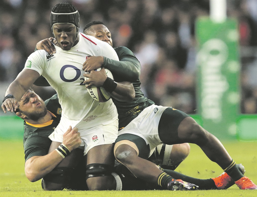 Sbu Nkosi and Duane Vermeulen tackle England’s Maro Itoje during yesterday’s Quilter International match at Twickenham Stadium Picture: Henry Browne / Getty Images
