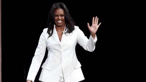 Former First Lady and author Michelle Obama appears onstage at Becoming: An Intimate Conversation with Michelle Obama at the Forum 