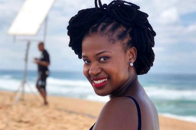 Zenande Mfenyana rocks an updo style with her locs.