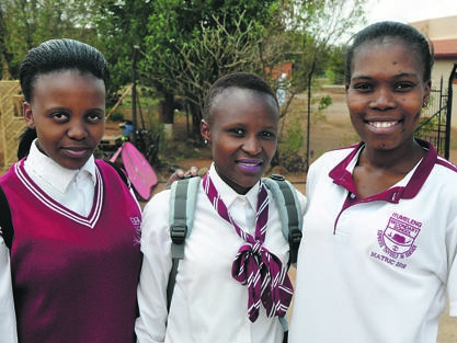 From left: Pupils Keamogetse Maledu, Mmapula Maneedi and Remoneilwe Mali enjoyed the Tswana exam.                Photo by Rapula Mancai