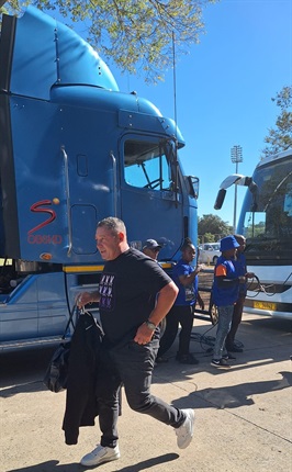 <p>As always, Steve Barker is smiling and exudes an optimistic aura as he leads his troops off the bus. There's not much to say, but "Good afternoon," as he surely hopes it will be for the Maroons.</p><p>- Tashreeq Vardien</p>