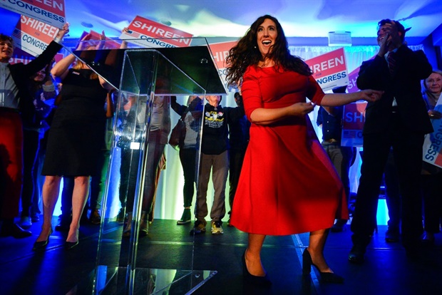 <em>Democratic candidate for Utah's 2nd congressional district Shireen Ghorbani dances after her concession speech at an election night party in Salt Lake City. (AP)</em>