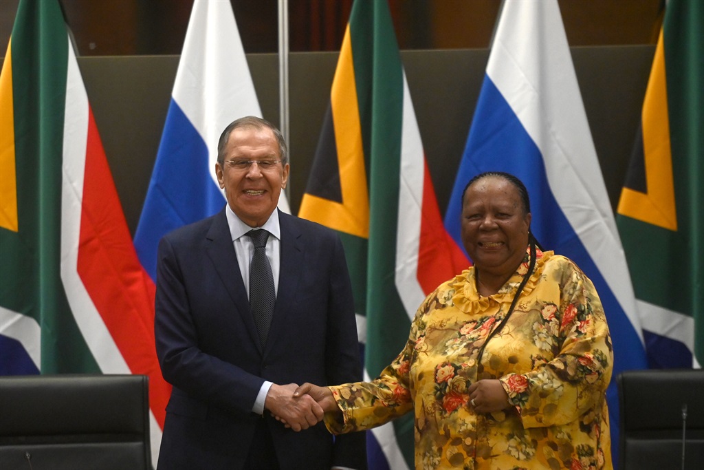 Russian Foreign Minister Sergey Lavrov and International Relations and Cooperation Minister Naledi Pandor shake hands in Pretoria during an official visit on Monday.