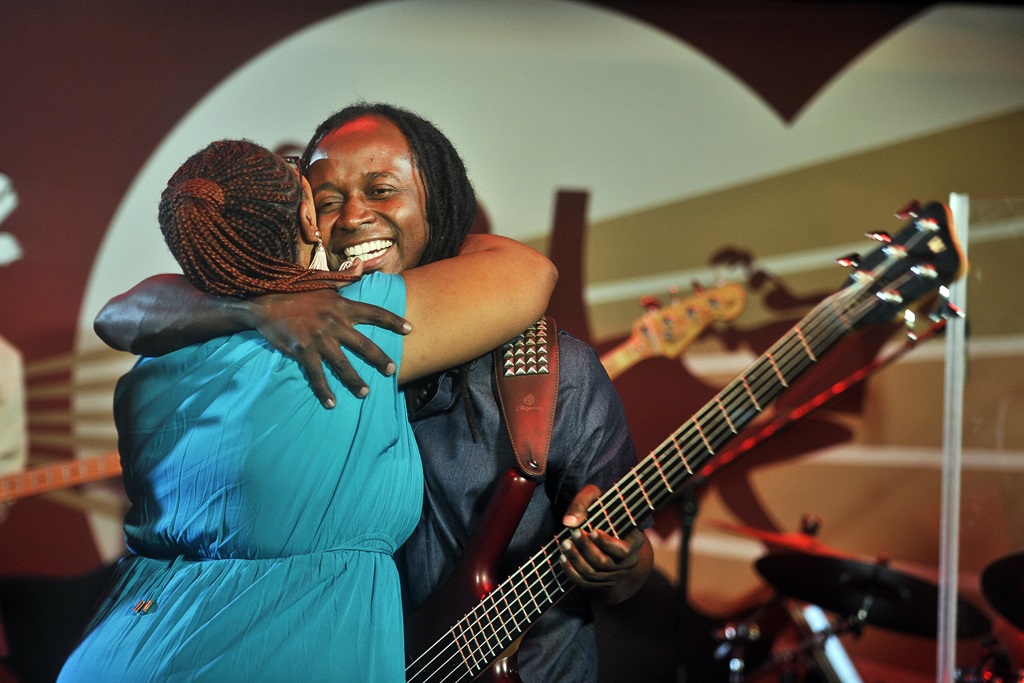 THE HUG AND SMILE OF JOY Bassist Gally Ngoveni and Siya Charles celebrate their win during the Emirates Pursuit of Jazz competition at Katzy's in Rosebank. Picture: Rosetta Msimango
