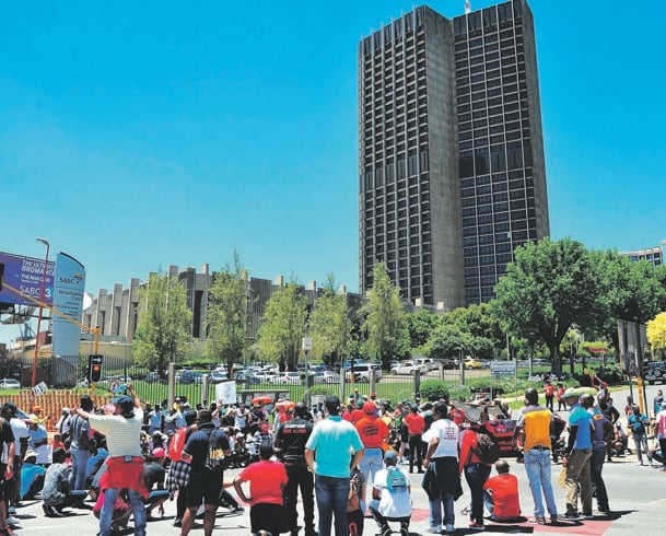 SABC employees protest outside the public broadcaster’s studios in December to demand salary increases. Picture: Veli Nhlapo/Sowetan /Gallo Images 