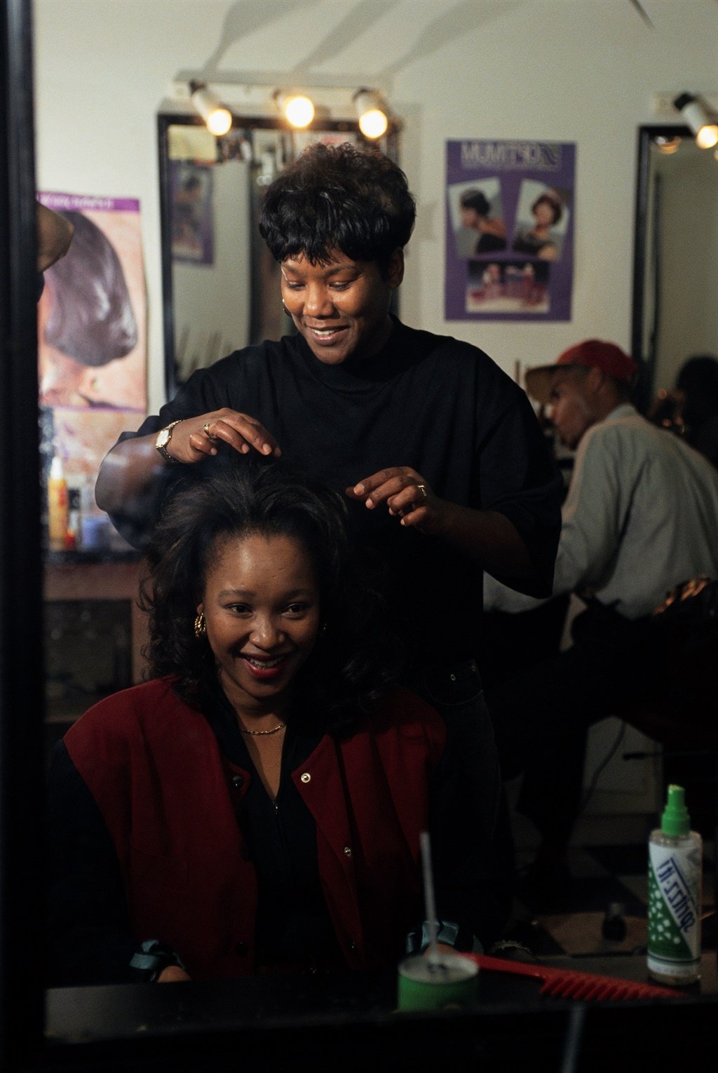 Zindzi Mandela gets her hair styled by Alece Coope