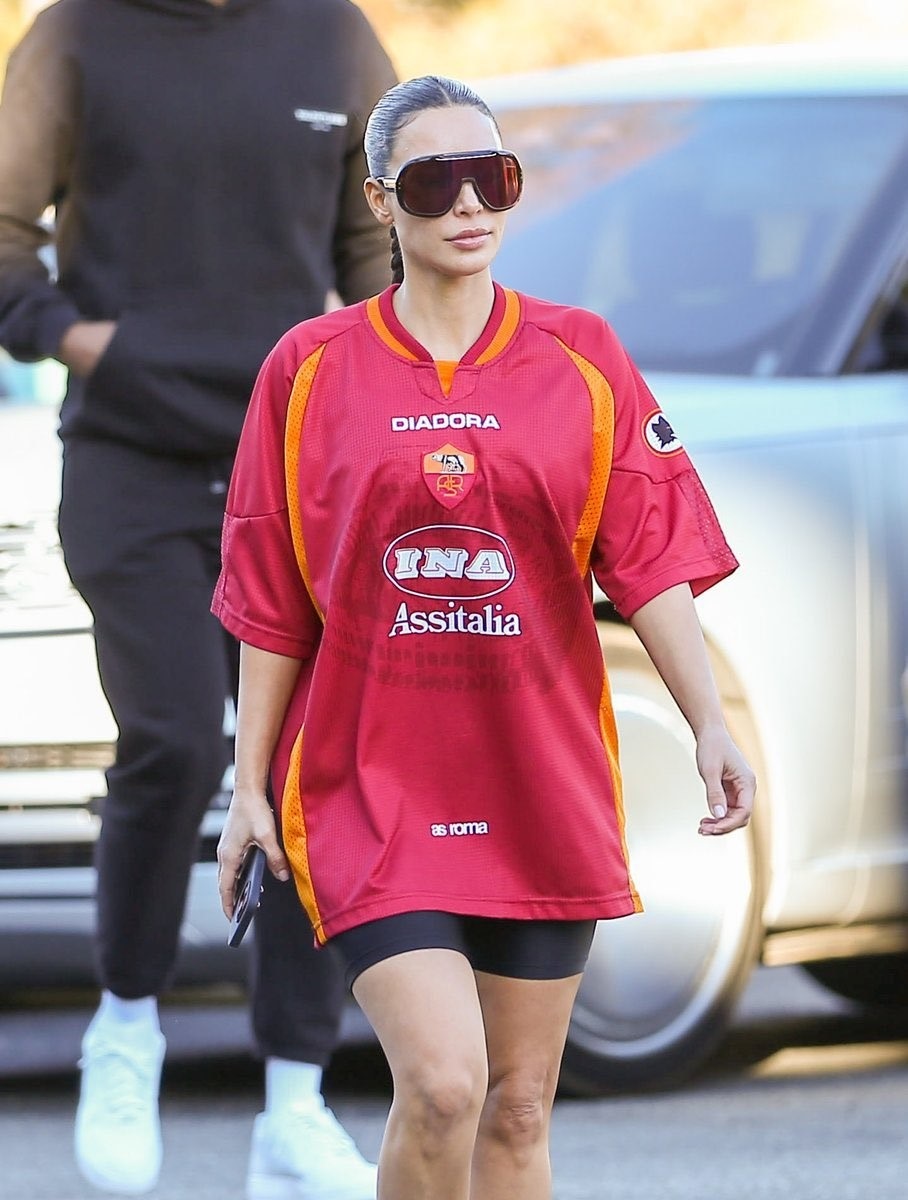 Kim Kardashian in a retro AS Roma jersey.