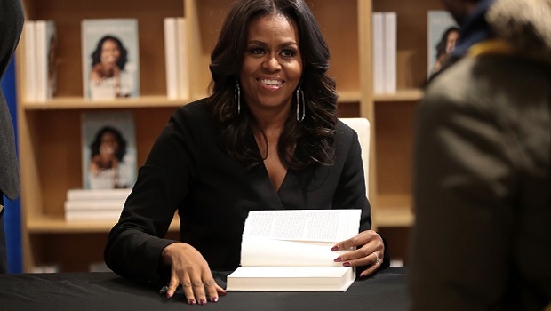 Former first lady Michelle Obama kicks off her Becoming book tour with a signing at the Seminary Co-op bookstore on 13 November 2018 in Chicago