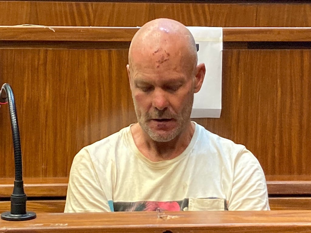 Gerhard Ackerman, who is accused of running a child sex ring, sits in the dock in the Gauteng High Court in Johannesburg on 30 January 2023.
