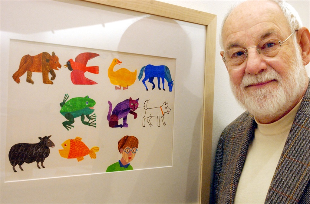 Artist Eric Carle, an illustrator and author of childrens books, with his work from the book, The Mixed Up Chameleon. Carle was instrumental in the planning and building of the museum. (Photo by Matthew J. Lee/The Boston Globe via Getty Images)