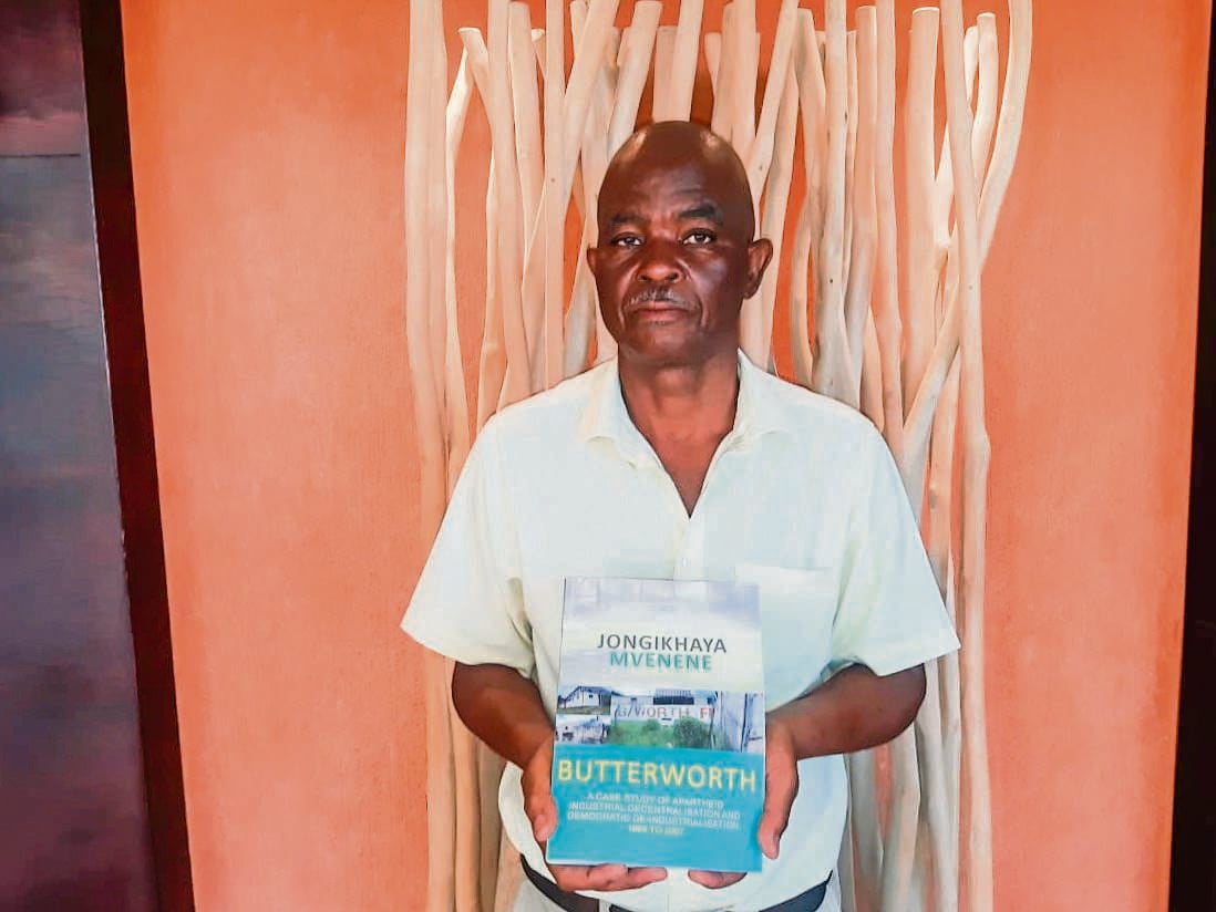 Dr Jongikhaya Mvenene with his book about Butterworth, before and after the apartheid era..     