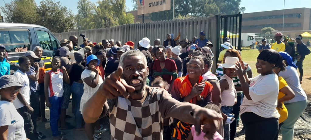 Angry residents from  Dukathole in Germiston, Ekurhuleni, protested outside the stadium on Saturday, 4 May. Photo by Happy Mnguni