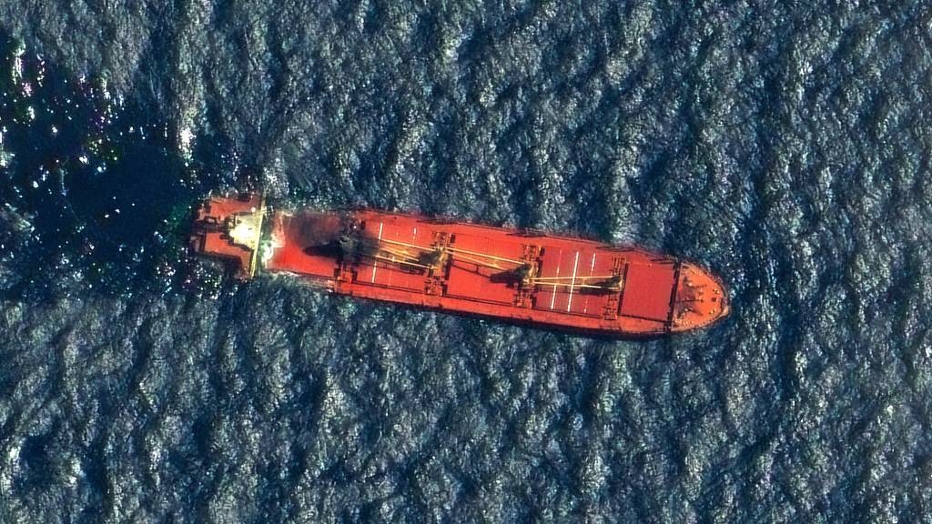 This satellite image released by Maxar Technologies shows the Belize-flagged cargo ship Rubymar, damaged in a 19 February missile strike claimed by the Iran-backed Houthi rebels, floating in the Red Sea. (Satellite image ©2024 Maxar Technologies/AFP)