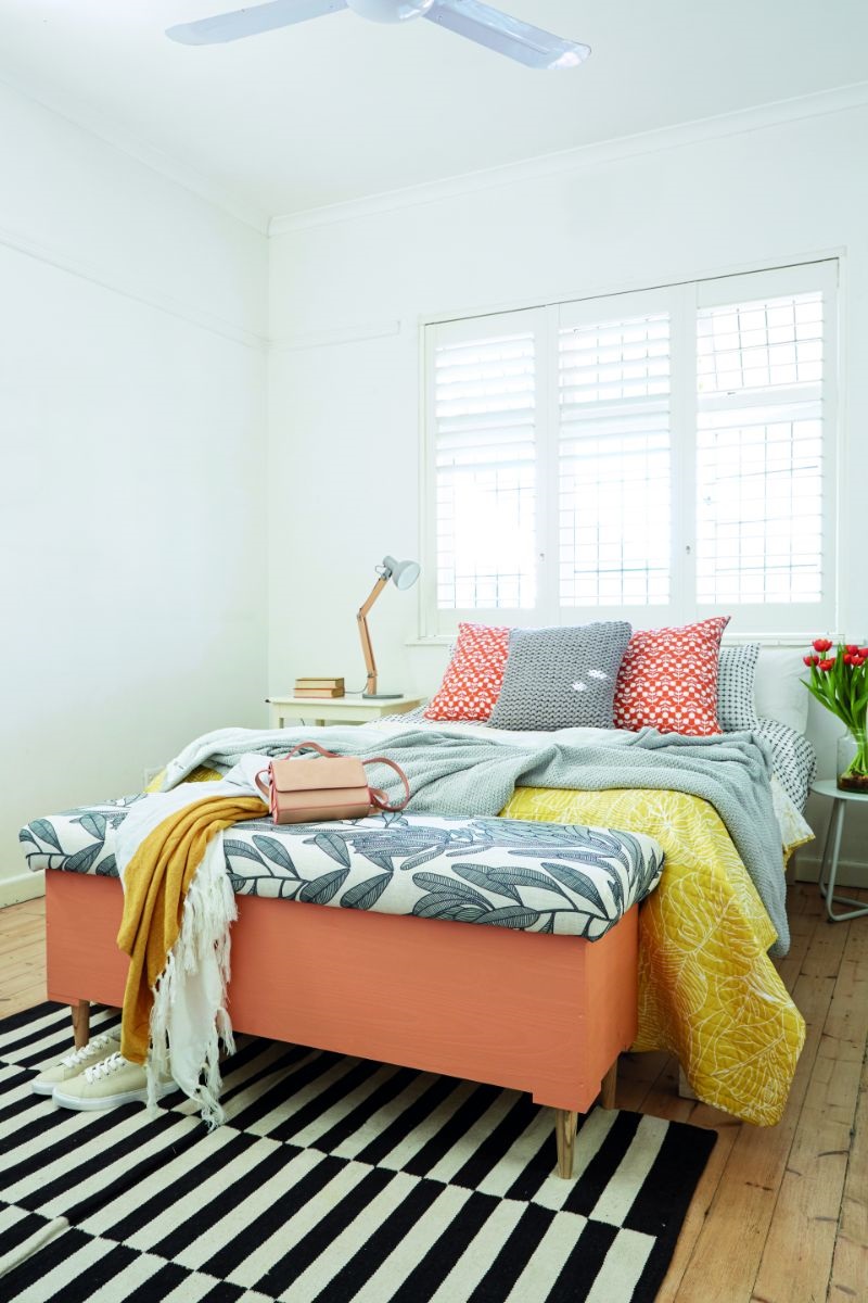 Orange scatters and bench fabric (tablecloth) from Mr Price Home; grey scatter, throws, quilt and lamp from Woolworths