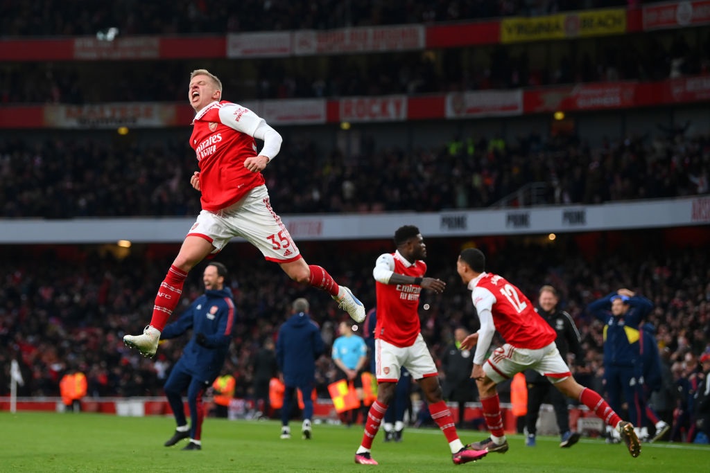 LONDON, ENGLAND - MARCH 04: Oleksandr Zinchenko of Arsenal celebrates the teams third goal, scored by teammate Reiss Nelson (not pictured) during the Premier League match between Arsenal FC and AFC Bournemouth at Emirates Stadium on March 04, 2023 in London, England. (Photo by Shaun Botterill/Getty Images)