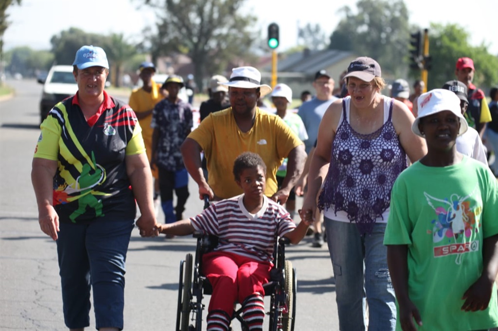 Families and those living with epilepsy took to the streets during awareness campaign. Photo by Phineas Khoza
