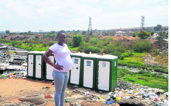 Velma Mukhari shares these non-flushing toilets with hundreds of people in her kasi.    Photo by                   Collen Mashaba     