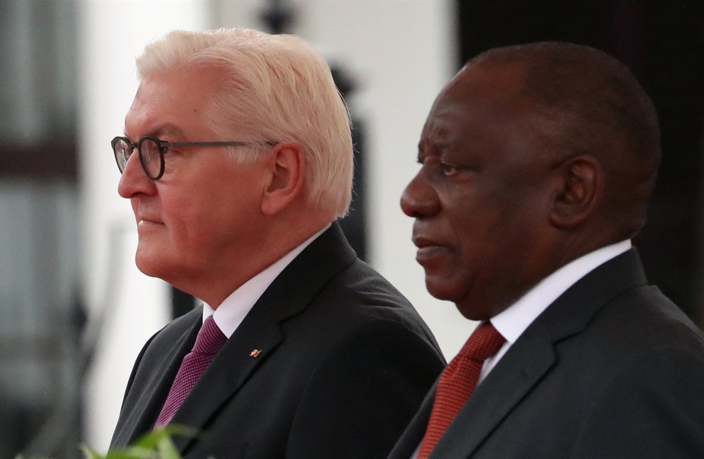 German federal president Frank-Walter Steinmeier and President Cyril Ramaphosa watch an army parade outside Parliament in Cape Town on Tuesday (November 20 2018). Picture: Mike Hutchings/Reuters