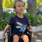 He lost the use of his legs following an infection – but this little boy is happy to be moving again