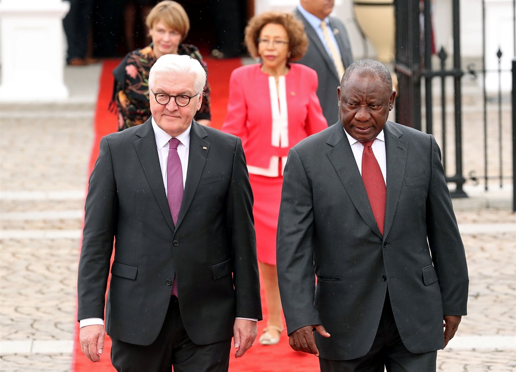 German Federal President Frank-Walter Steinmeier walks with South African President Cyril Ramaphosa outside Parliament in Cape Town on Tuesday (November 20 2018). Picture: Mike Hutchings/Reuters 