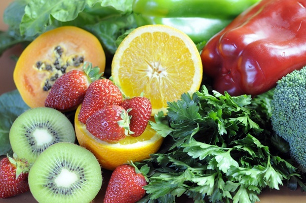 Sources of Vitamin C - oranges, strawberries, red 