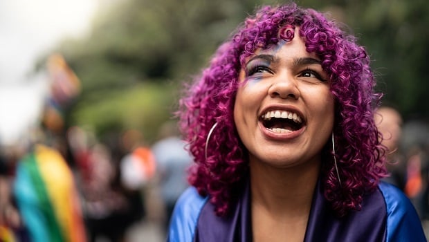 Woman with curly purple hair
