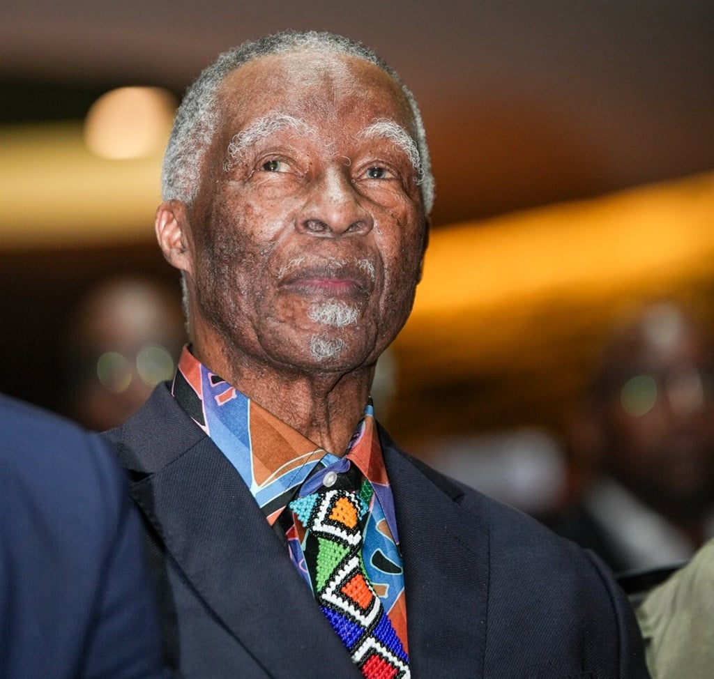When delivering his address at the launch, Thabo Mbeki, dressed in a coloured shirt and traditional tie with Ndebele patterns, acknowledged receiving them as a gift from Esther Mahlangu.
