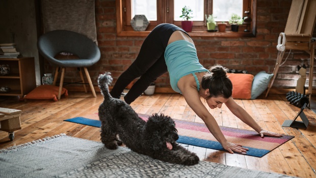Women and dog exercising. (PHOTO: Getty Images)