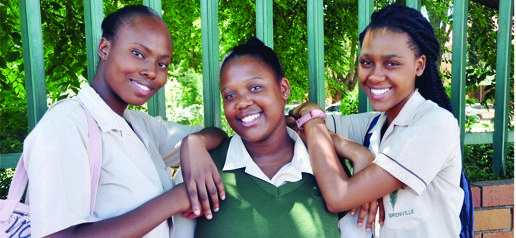 From left: Katlego Sepheka, Boikarabelo Peele and Masego Masilo from Grenville High School have a reason to smile.        Photo by Rapula Mancai