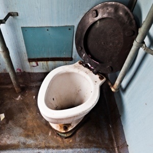 Patients and staff need to share one dirty toilet. 