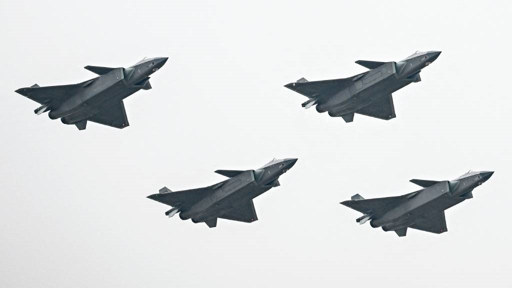 Chinese J-20 stealth fighters of the People's Liberation Army (PLA) perform in Zhuhai in southern China's Guangdong province. (CNS/AFP) 