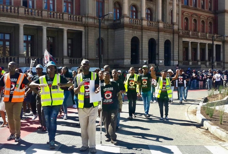 Residents of mining communities picketed outside the Pretoria High Court in April in support of the Right To Say No to Mining Campaign. (Zoë Postman, GroundUp)