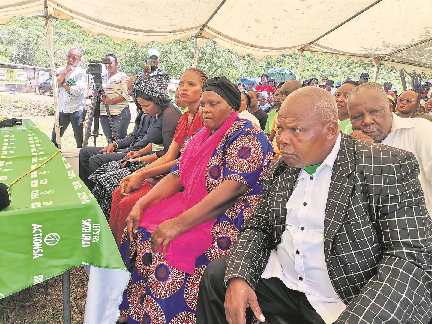 The family of Yvonne Mnisi during the 7th commemoration of the Lily Mine tragedy. Inset: Action SA president Herman Mashaba, who is assisting the families.                          Photos by Bulelwa Ginindza 