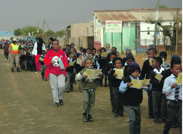 Children at a Walk and Read event.  Photo by Phineas Khoza