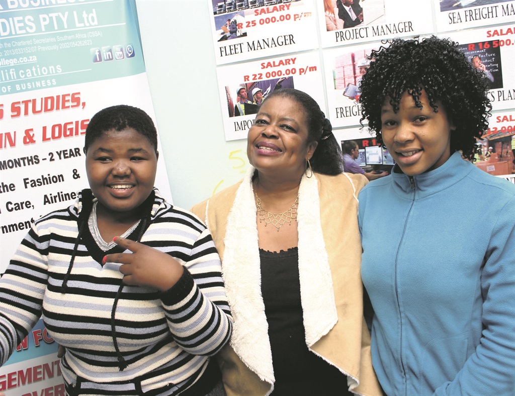 College for Business and Maritime Studies lecturer Winnie Moses (centre) with Fezeka Jali and Sophumelela Qashani.