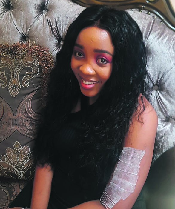 Sbahle Mpisane relaxes at home after being released from hospital on Friday. 