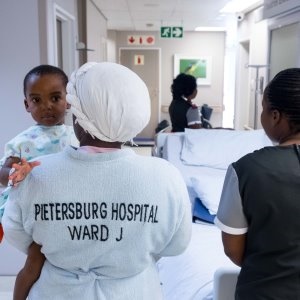 A child accompanied by his mother for surgery as part of ongoing collaborative surgeries between Mediclinic and the Limpopo Department of Health