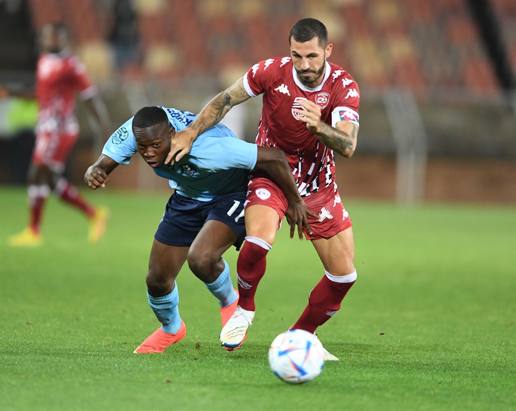POLOKWANE, SOUTH AFRICA - FEBRUARY 08: Msindisi Khosa of Liver Brothers and Daniel Cardoso of Sekhukhune United during the Nedbank Cup last 32 match between Sekhukhune United and Liver Brothers at Peter Mokaba Stadium on February 08, 2023 in Polokwane, South Africa. (Photo by Philip Maeta/Gallo Images)