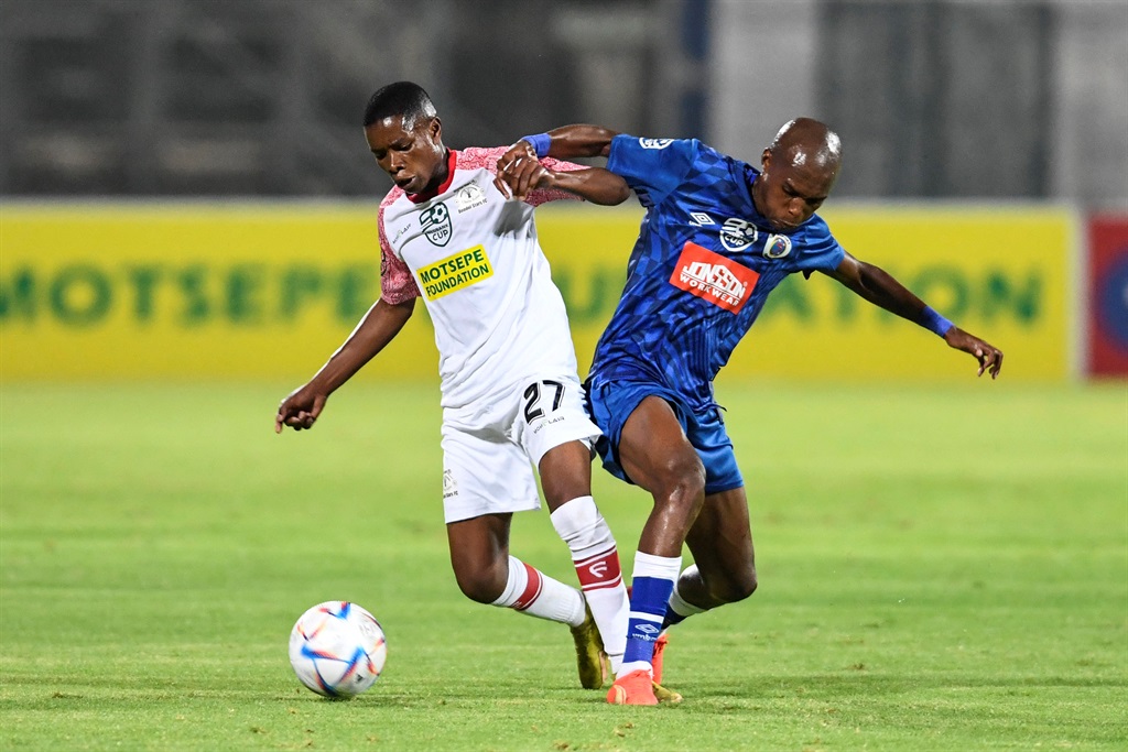 PRETORIA, SOUTH AFRICA - FEBRUARY 08:  Zukile Kewuti of SuperSport United and Thabana Mabena of  Dondol Stars  during the Nedbank Cup, Last 32 match between SuperSport United and Dondol Stars at Lucas Moripe Stadium on February 08, 2023 in Pretoria, South Africa. (Photo by Lefty Shivambu/Gallo Images)