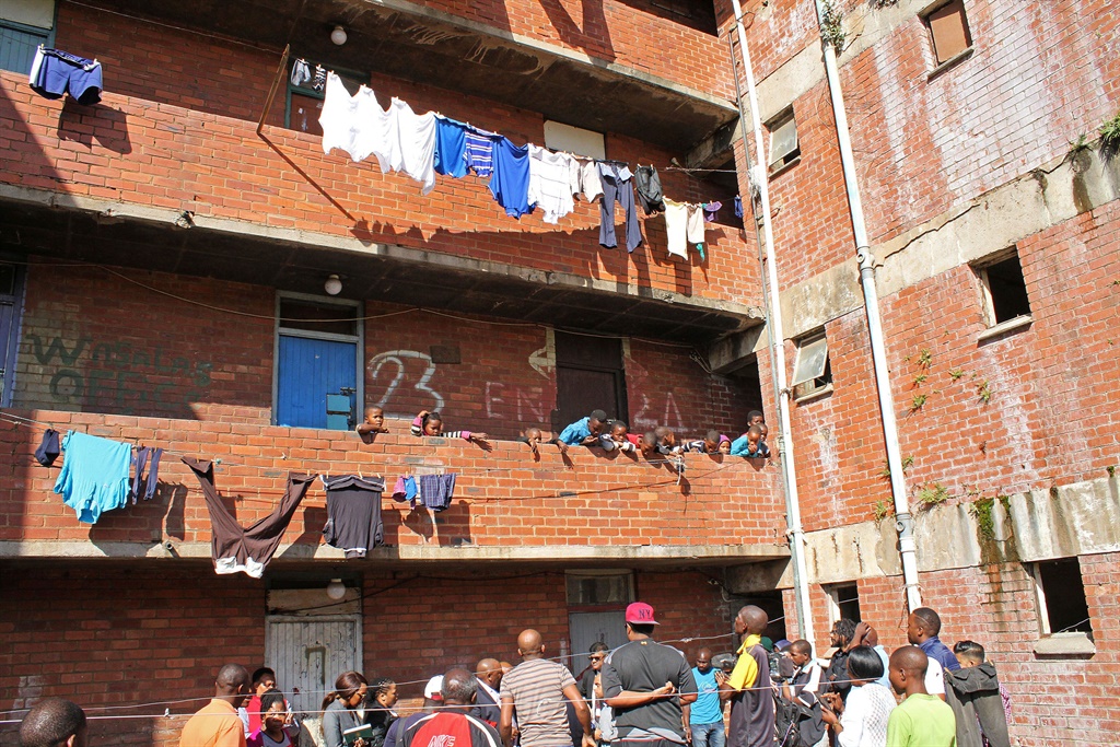 Moerane Commission of Inquiry investigators visit the Glebelands hostel in Umlazi in July to gather evidence. More than 90 people have been murdered at the hostel since March 2014. Picture: Siyanda Mayeza