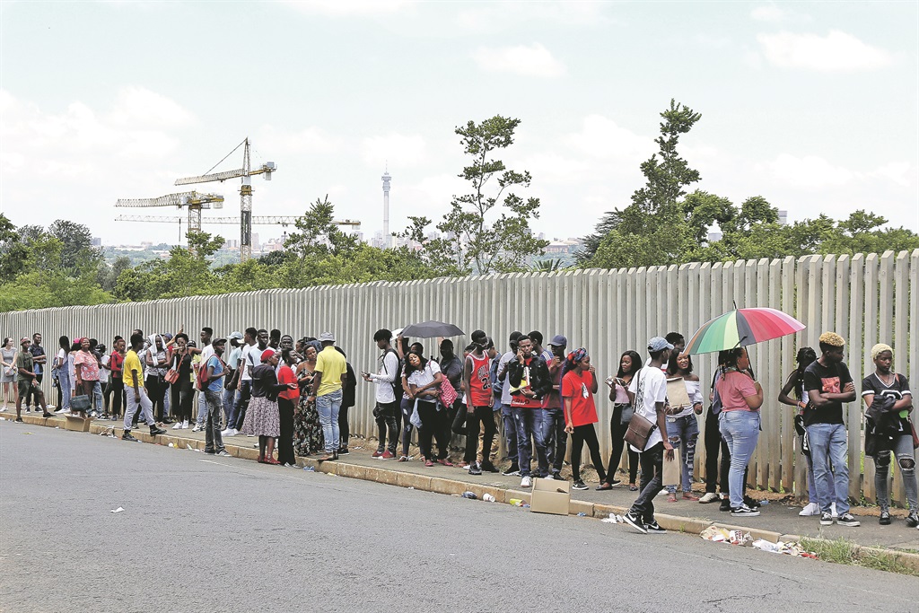 Prospective students queuing outside the University of Johannesburg hoping for admission. Some institutions do allow walk-ins, but online applications are preferable. Picture: Rosetta Msimango 