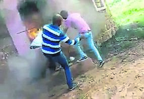 In this screengrab, men are seen attacking a gogo.