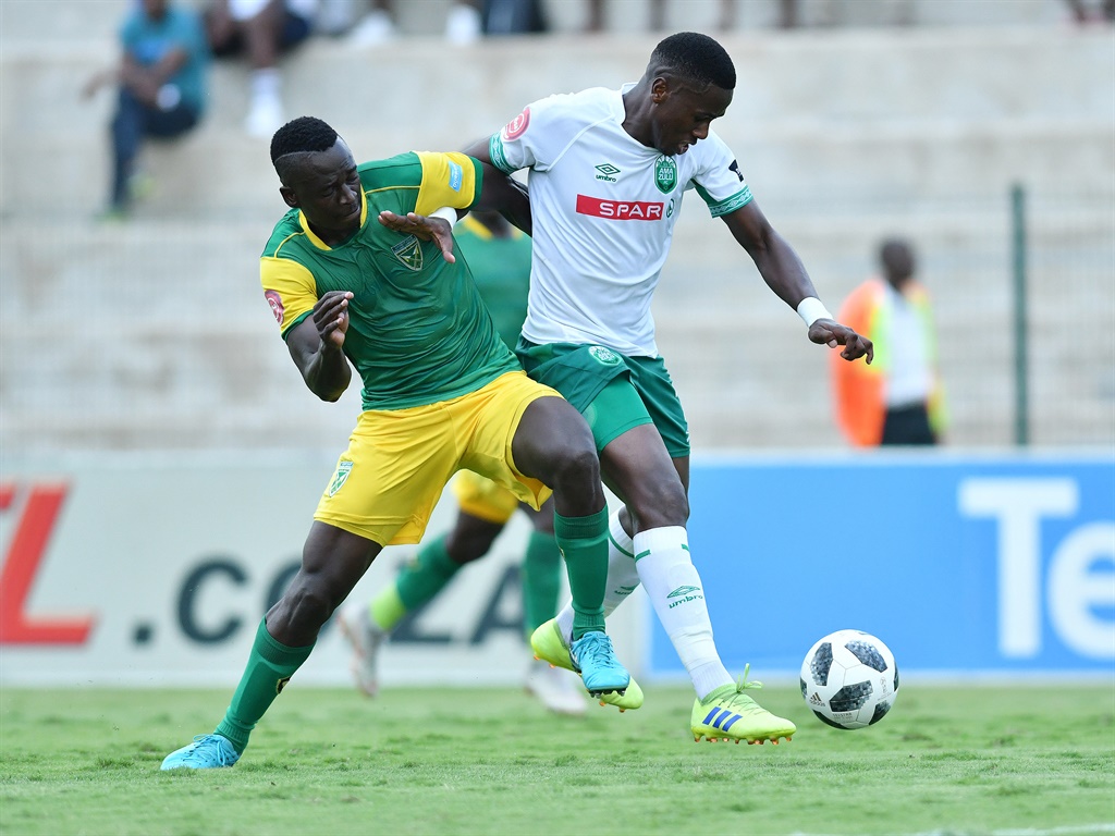 Limbikani Mzava  of Golden Arrows and Ovidy Karuru of Amazulu FC  during the Absa Premiership match between Golden Arrows and AmaZulu FC at Sugar Ray Xulu Stadium on April 14, 2019 in Durban, South Africa. (Photo by Anesh Debiky/Gallo Images)