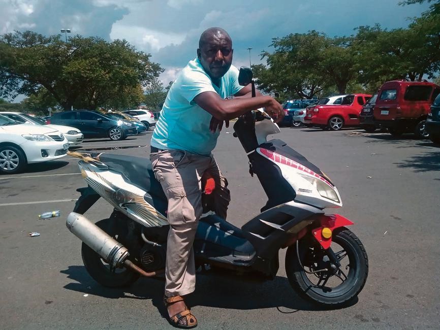 Isaac Nkosi with his first and only ride. Photo by Malereko Tae