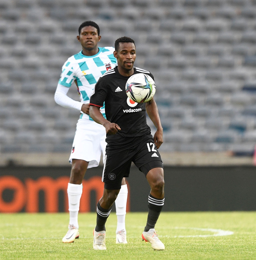 JOHANNESBURG, SOUTH AFRICA - DECEMBER 11: Collins Makgaka of Orlando Pirates challenges Bathusi Aubass of TS Galaxy during the DStv Premiership match between Orlando Pirates and TS Galaxy at Orlando Stadium on December 11, 2021 in Johannesburg, South Africa. (Photo by Sydney Mahlangu/BackPagePix/Gallo Images)