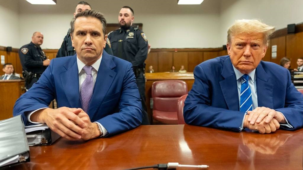 Former US President Donald Trump (R), with his attorney Todd Blanche, attends the second day of his trial for allegedly covering up hush money payments linked to extramarital affairs, in Manhattan Criminal Court in New York City. (Mark Peterson/Pool/AFP)