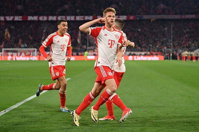 Bayern Munich's Joshua Kimmich celebrates during the UEFA Champions League quarter-final second leg match against Arsenal at Allianz Arena in Munich on 17 April 2024. (Justin Setterfield/Getty Images)