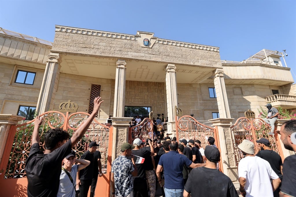 Supporters demonstrated inside the courtyard of the Swedish embassy in Baghdad after they breached the building briefly over the burning of the Quran by an Iraqi living in Sweden.