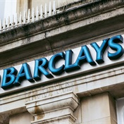 Barclays bank shares tumble as bad loans surge