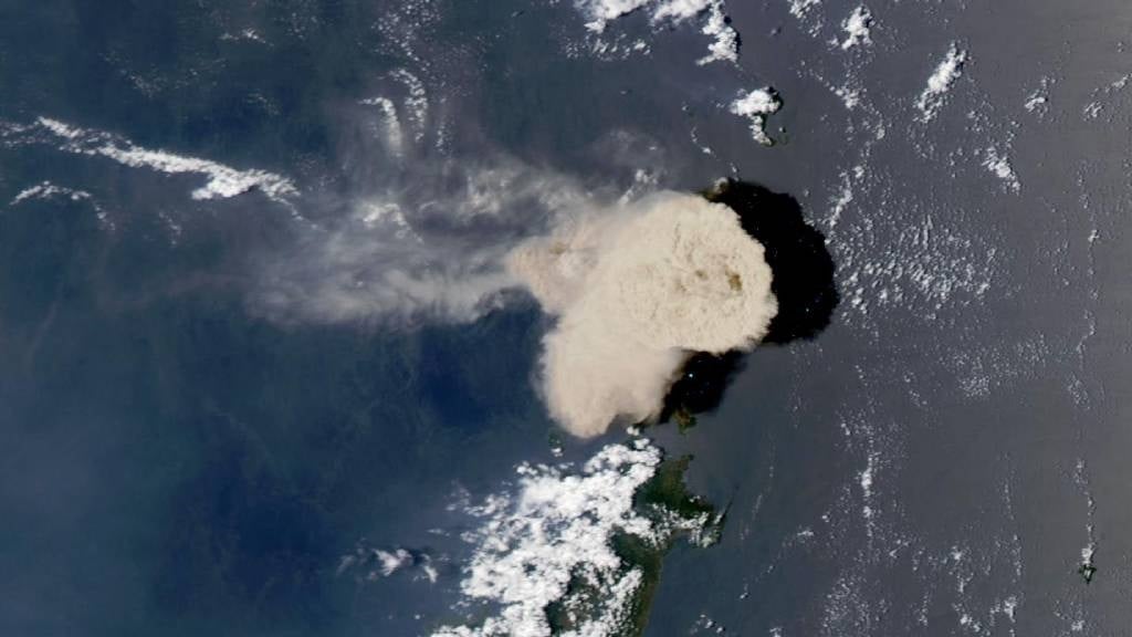 This image released by NASA acquired by NASA's MODIS (or Moderate Resolution Imaging Spectroradiometer), a key instrument aboard the Aqua satellite shows and ash cloud emanating from the Ruang Volcano. (NASA/AFP)